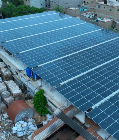 Rows of installed solar panels across the SRS Industries rooftop